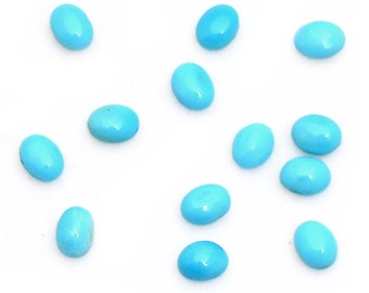 May include: A collection of 13 oval-shaped turquoise cabochons, each with a smooth, polished surface and a vibrant blue color.