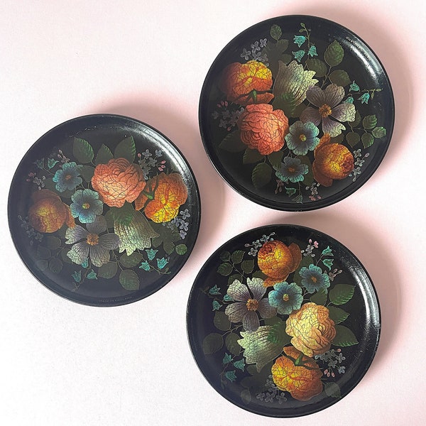 trio of vintage flower metal coasters, collectable painted floral cocktail mat set, 3 decorative black metal tin drinks coasters, retro bar