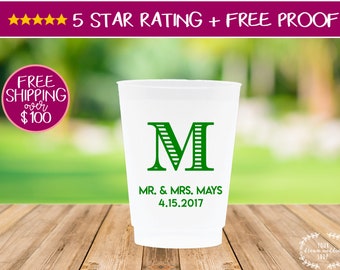 May include: White plastic cup with a green letter M and the text "MR. & MRS. MAYS 4.15.2017".