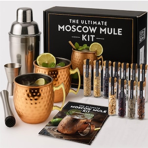 May include: A Moscow Mule cocktail kit with copper mugs, a shaker, and various ingredients in glass vials. The kit includes a muddler, a jigger, and a recipe booklet. The box reads "THE ULTIMATE MOSCOW MULE KIT".