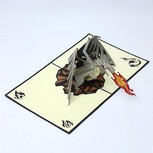 Celebrazione del regalo fatta a mano Carta pop-up del drago nero artigianale