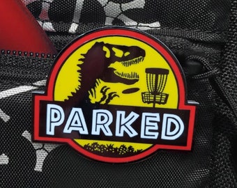 T-Rex Parked Disc Golf Pin™ - High Quality Hard Enamel Pin