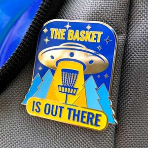 The Basket Is Out There Disc Golf Pin™ - High Quality Hard Enamel Pin - Disc Golf Christmas Gift
