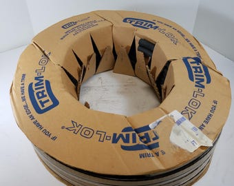 Sello de goma Trim-Lok X125HT de 3/4" y 250 pies