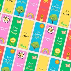 May include: Colorful bookmarks with positive affirmations and cute illustrations. Each bookmark features a different design, including a smiling flower, a tree, a caterpillar, a rainbow, and a sun. The text includes phrases like "I am happy" and "I am capable of anything."