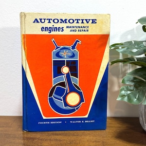 May include: Vintage book titled "Automotive Engines Maintenance and Repair" with a blue, orange, and white cover. The cover features an illustration of an engine component. The book is a fourth edition by Walter E. Billiet.