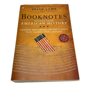 May include: A book titled "Booknotes: Stories from American History" by Brian Lamb, host of C-SPAN's Booknotes. The book cover features a red, white, and blue American flag and includes a list of leading historians who contributed to the book.