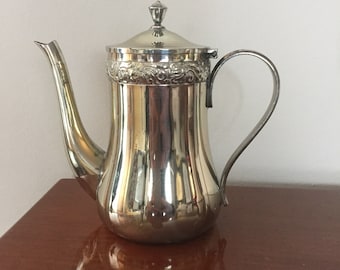 Beautiful coffee maker with silver-plated lid