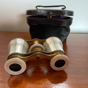 Antique mother-of-pearl binoculars, leather case.