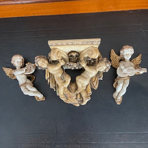 Beautiful Italian cherub Angels to hang on the wall.