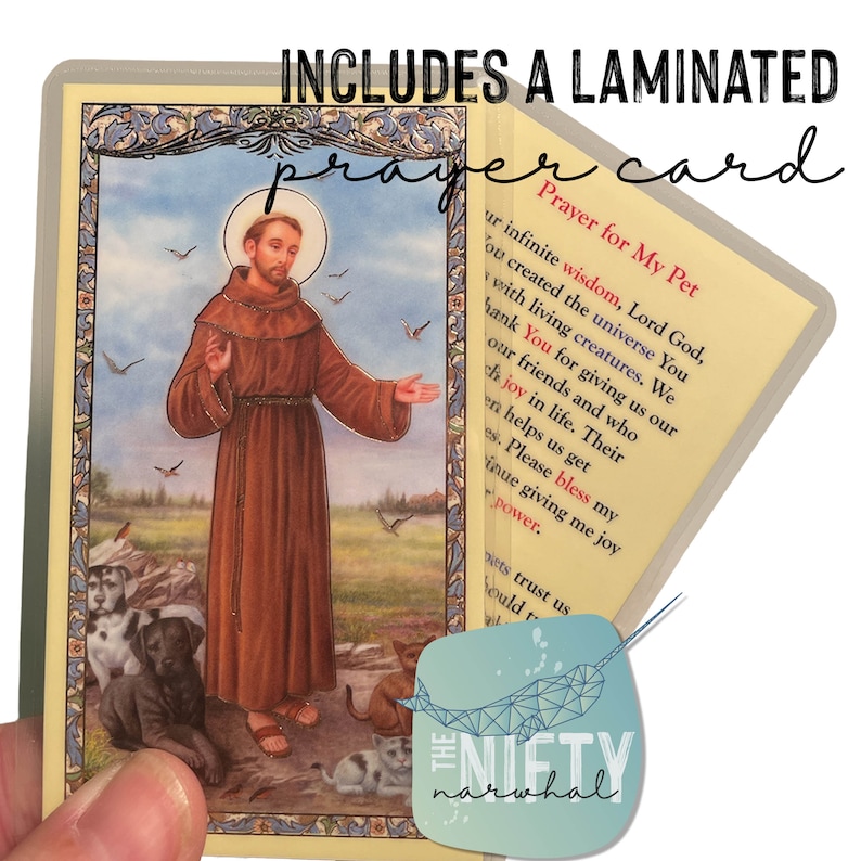 May include: A laminated prayer card featuring Saint Francis of Assisi with animals. The card includes a prayer for pets, "Prayer for My Pet: Our infinite wisdom, Lord God, You created the universe You with living creatures. We thank You for giving us our friends and who bring joy in life. Their presence helps us get through. Please bless my continue giving me joy and power."