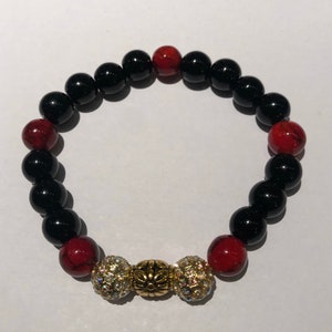 Black Onyx and Red Garnet bead bracelet.
