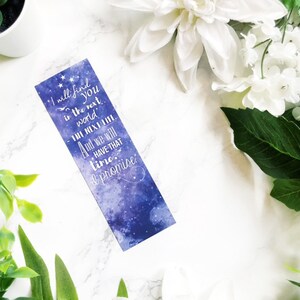 May include: A blue and purple galaxy-themed bookmark with the text "I will find you in the next world. The next life. And we will have that time. I promise."