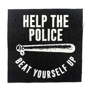 May include: Black and white patch with the text "Help the Police Beat Yourself Up" and a drawing of a baseball bat.