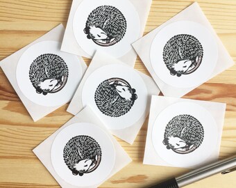 Six sleeping opossum stickers. Durable vinyl.