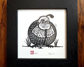 Round female quail art in square frame. Original signed linocut quail.