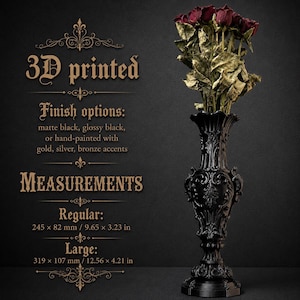 May include: A black 3D printed vase with ornate relief detailing, holding a bouquet of dried dark red roses. Text on the left lists finish options and measurements: Regular 245 x 82 mm and Large 319 x 107 mm for this decorative item.