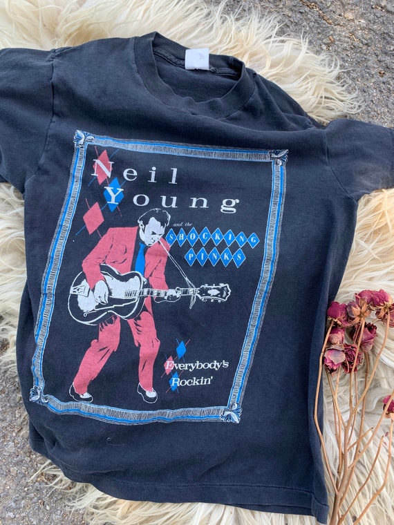 Rare vintage 1983 Neil Young and the Shocking pink