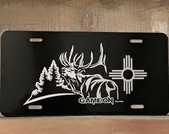 GAME ON Engraved front license plate. Challenger bull elk design with Zia or without