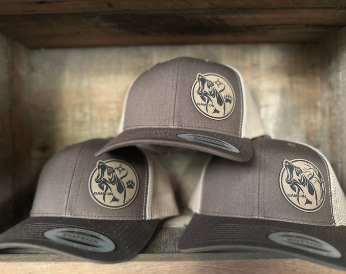 Game On hound dog hat. Snap back hat in brown available in 3 designs. With or without the zia message for  more color options.