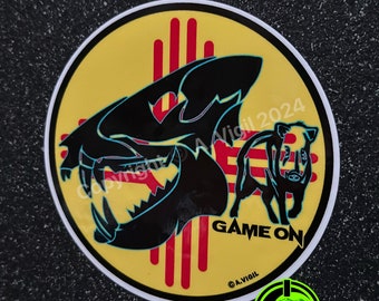 GAME ON Trout Squatch . Available in with the NM or American background in a 6” or 3.5” decal.