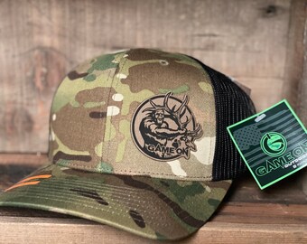 GAME ON! Deadhead Squatch SnapBack trucker hat available in two colors. One size fits most