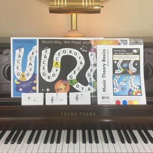 Learn treble clef, bass clef & ledger line notes with Musically We Float Along Music Theory Game