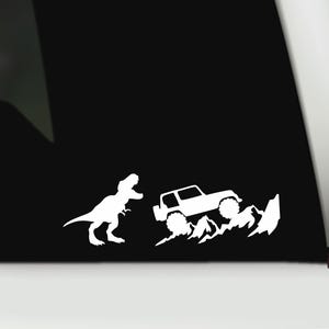 Jurassic T-Rex and SUV vinyl decal | SUV Dinosaur sticker | Trex Jurassic sticker | Dino bumper sticker | Dino Chasing SUV Mountain Decal
