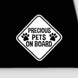 Pets on board vinyl decal | Precious pets on board bumper sticker | Pets on board car truck window sticker
