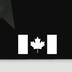 May include: A white decal of the Canadian flag, with a maple leaf emblem and two vertical rectangles on a black backdrop. The design is simple and bold, suitable for various applications.