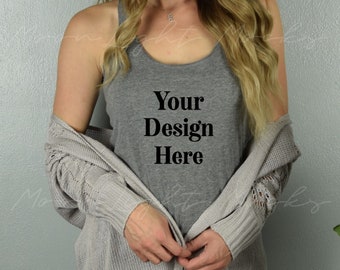 May include: A gray tank top with the text "Your Design Here" is worn under a light gray cardigan. The cardigan has a textured knit design and is open in the front.