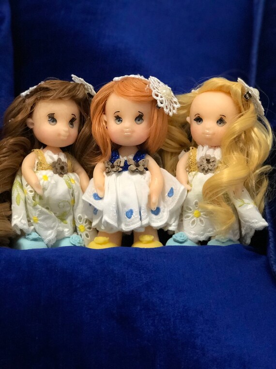 three cute dolls
