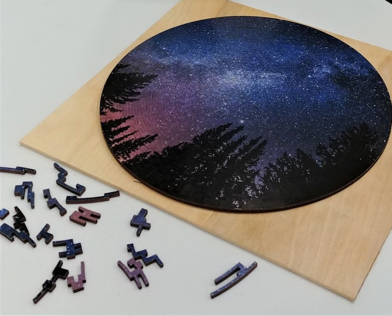 Pieces of the Galaxy Wooden Mars Puzzle with display stand and keychain