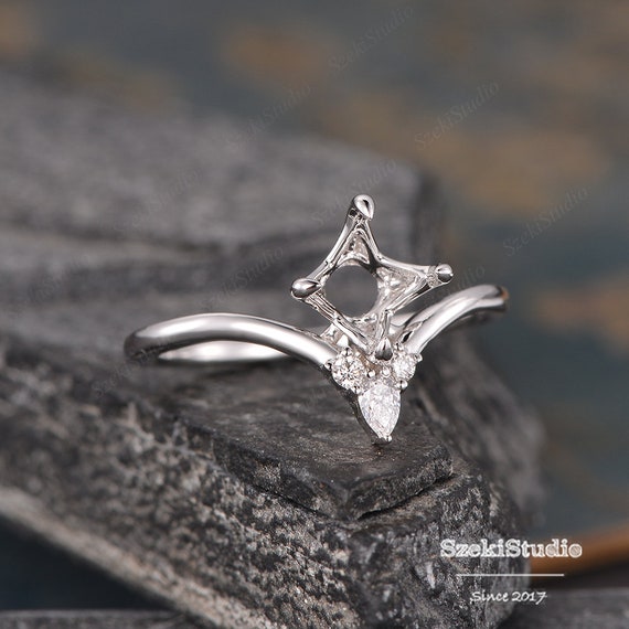 Infinity engagement shop ring setting