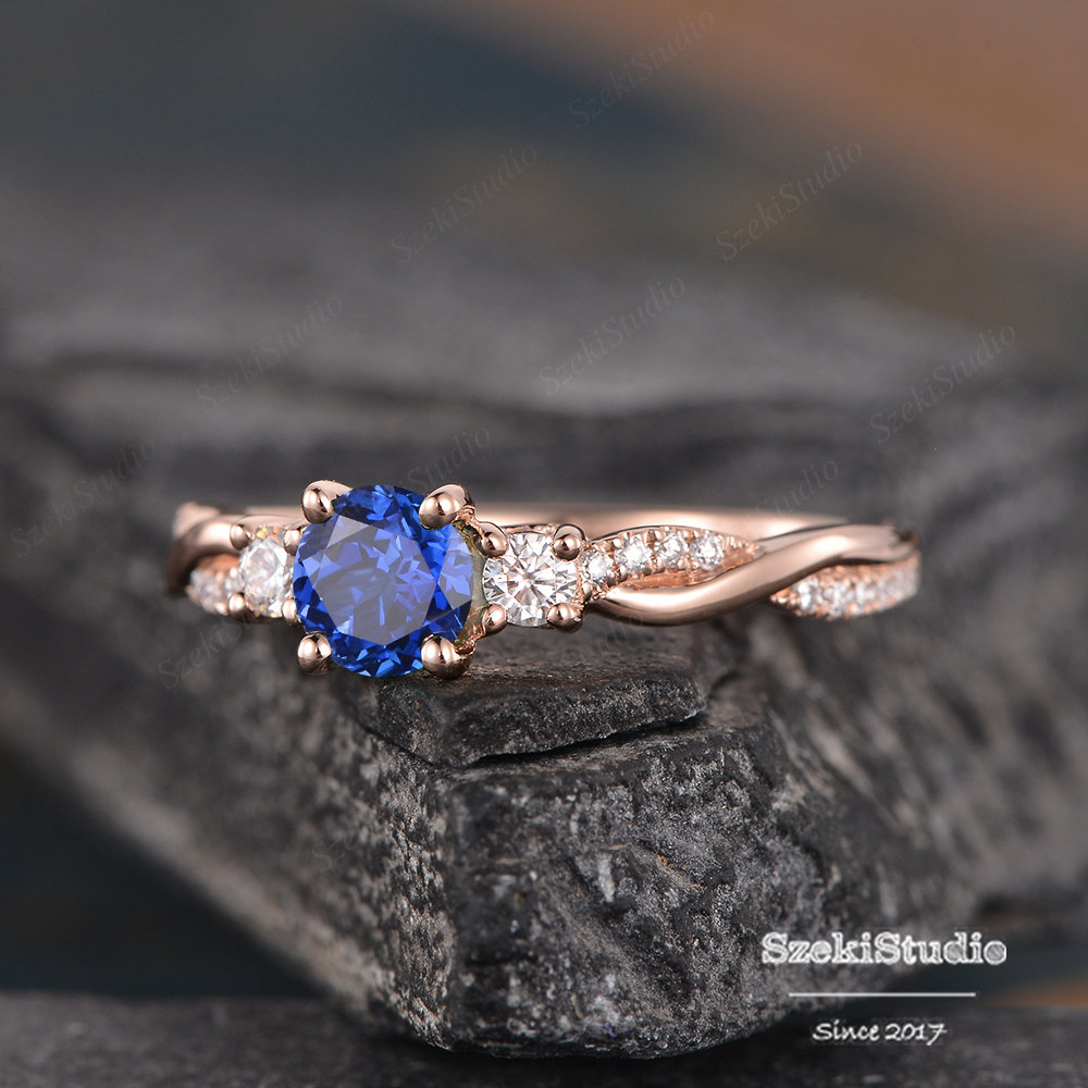 Rose Gold Sapphire Engagement Ring Twist Three Stone Blue Sapphire