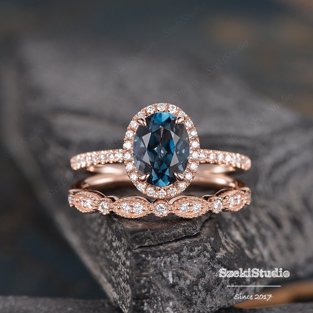 Rose gold blue topaz engagement ring deals