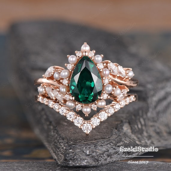 Emerald and pearl engagement rings deals