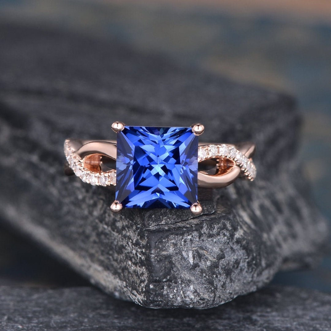 Princess Cut Diamond And Sapphire Ring
