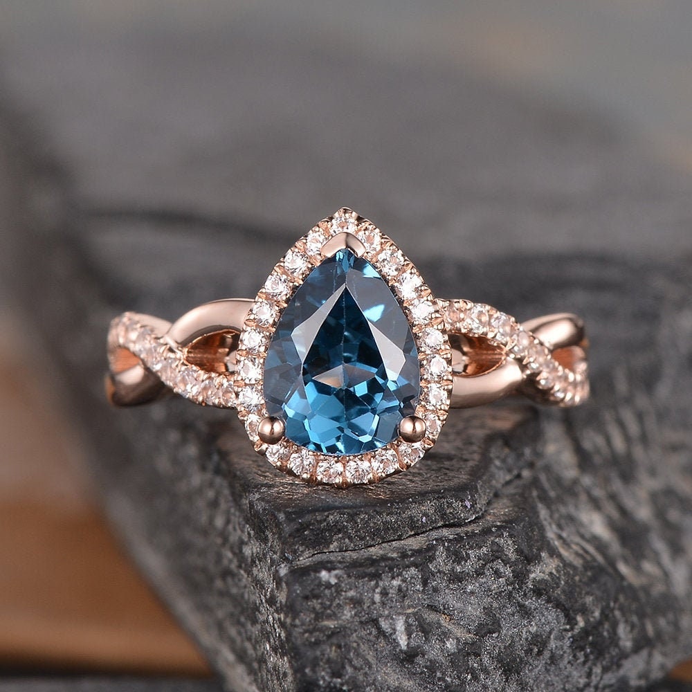 Pear shaped blue topaz outlet engagement ring