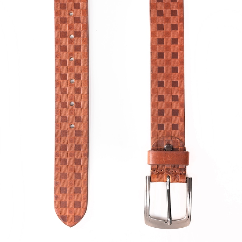 May include: A brown leather belt with a checkered pattern and a silver buckle.