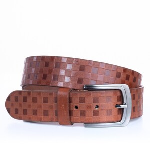 May include: A brown leather belt with a checkered pattern and a silver buckle.