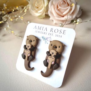 Adorable Otter Earrings Cute Animal Polymer Clay Dangle Earrings custom jewelry with a Heart, Shell, Baby otter. Beach Vacation Gift for Her