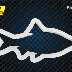 May include: White plastic cookie cutter shaped like a roach, a type of fish. The cutter is on a black and blue background.