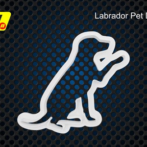 Peut inclure: Emporte-pièce en plastique blanc en forme de chien Labrador Retriever assis. Labrador Pet Dog.