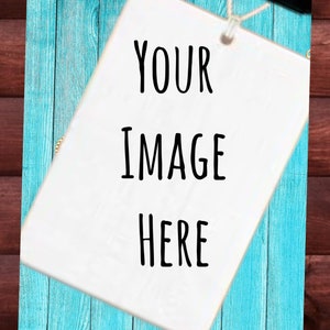 May include: A white tag with the text "YOUR IMAGE HERE" on a blue wooden background.