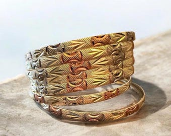 Gold plated semanario bangles