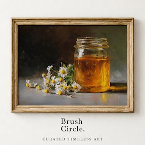 May include: A framed still life painting featuring a glass jar filled with golden liquid, likely honey, next to a bouquet of white daisies with yellow centers. The text "Brush Circle. CURATED TIMELESS ART" is at the bottom.