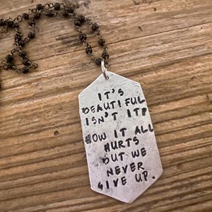 We never give up necklace