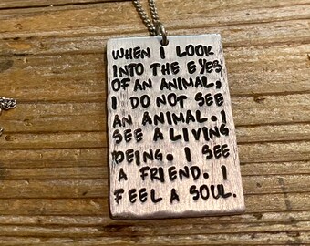 When I look into the eyes of an animal necklace