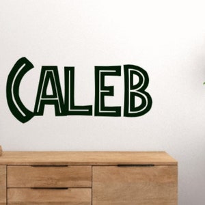 Jurassic Park name decal. Dinosaur wall decals. Kid’s bedroom wall stickers.  Jurassic Park wall stickers. Jurassic Park wall decals.
